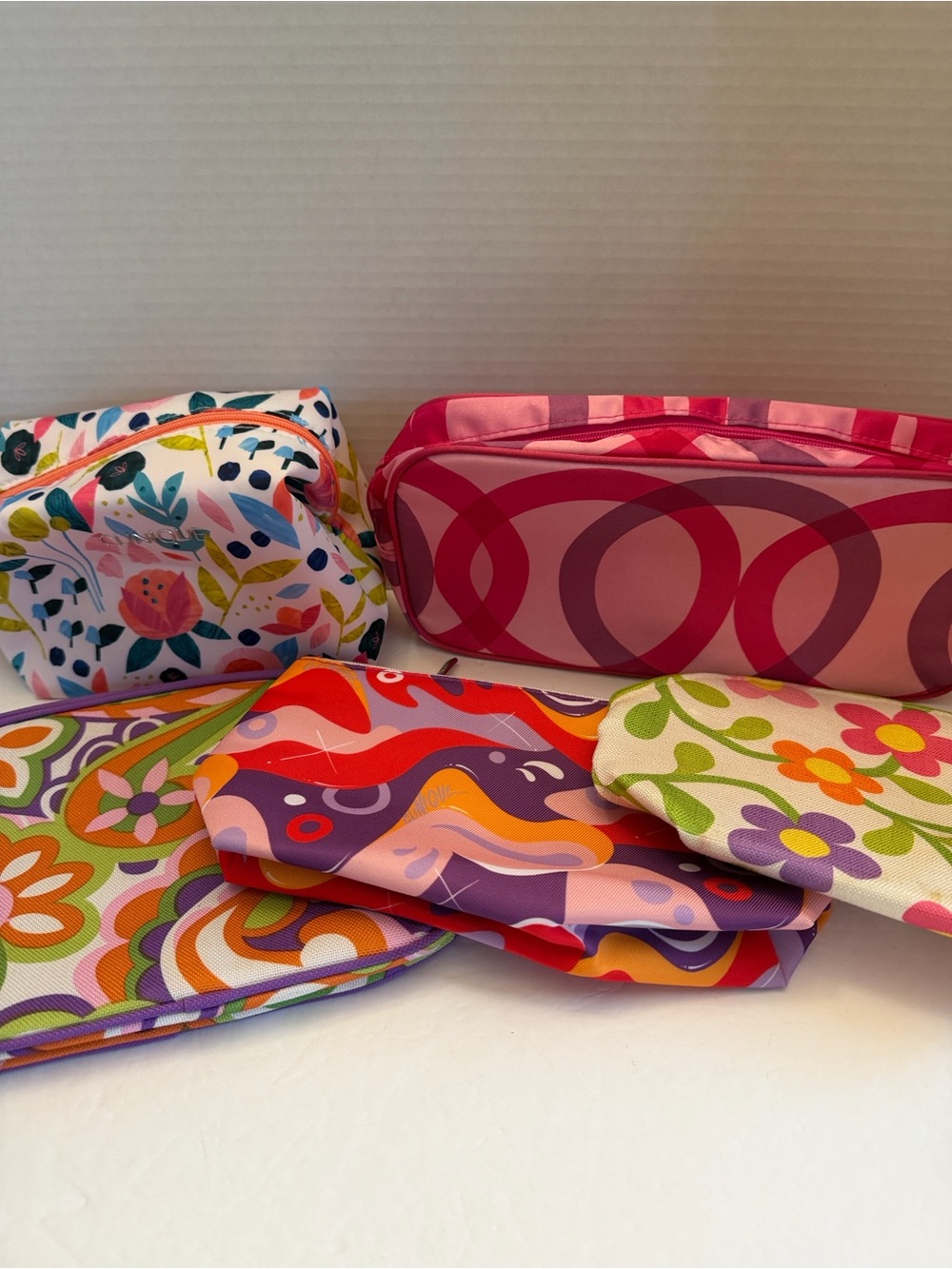 Clinique Bundle of 5 Pink Floral and Geometric Cosmetic Bag Set